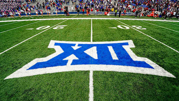 Oct 23, 2021; Lawrence, Kansas, USA; A general view of the Big 12 Conference logo on the field after the game between the Kansas Jayhawks and the Oklahoma Sooners at David Booth Kansas Memorial Stadium. Mandatory Credit: Jay Biggerstaff-USA TODAY Sports